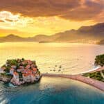 Old town and beach Sveti Stefan sea island, Budva, Montenegro, Europe