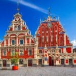 Riga, Latvia. City Hall Square with House of the Blackheads, sunset summer hours.