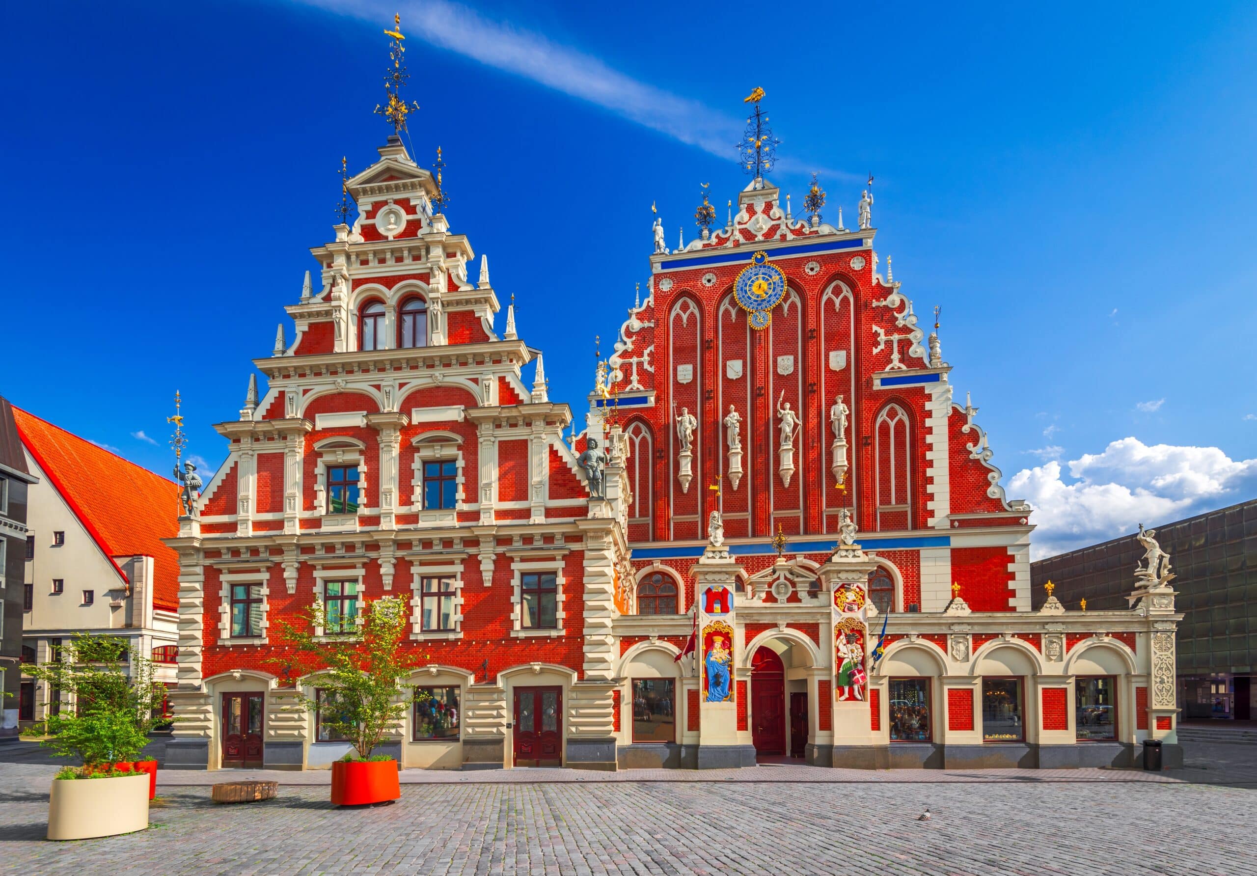 Riga, Latvia. City Hall Square with House of the Blackheads, sunset summer hours.