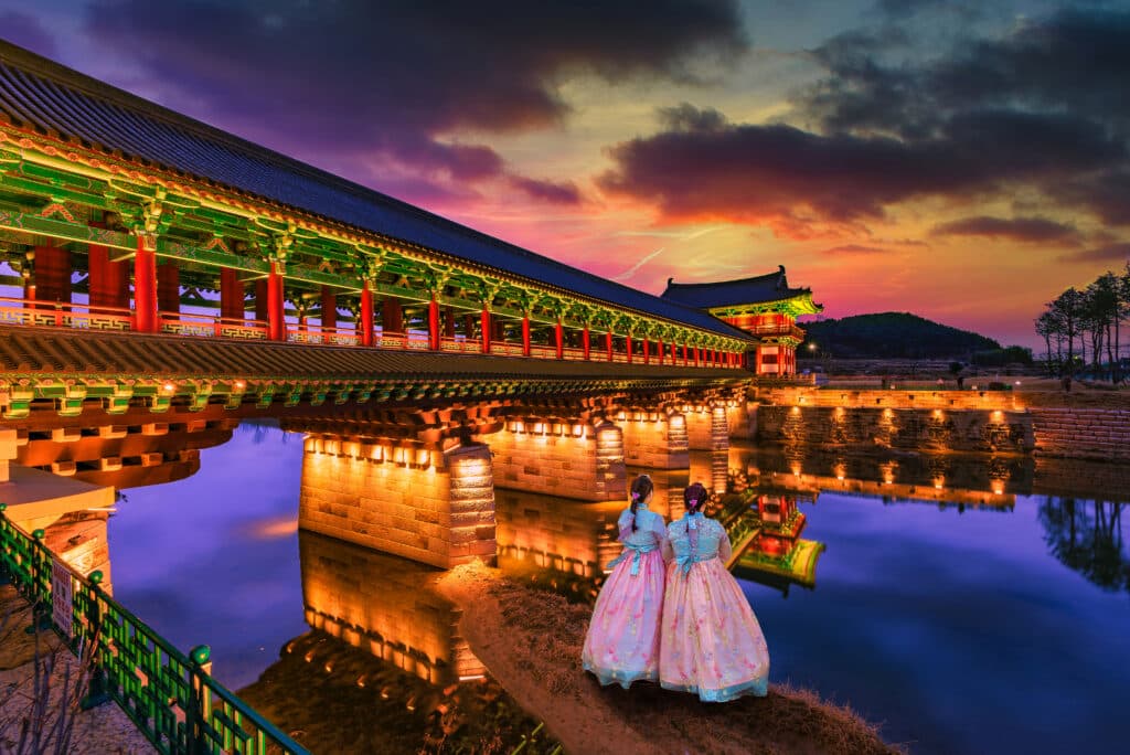 Woljeonggyo Bridge in Gyeongju illuminated at night with reflections