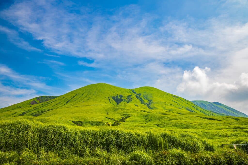 Green volcanic hills in Aso-Kuju National Park in Japan