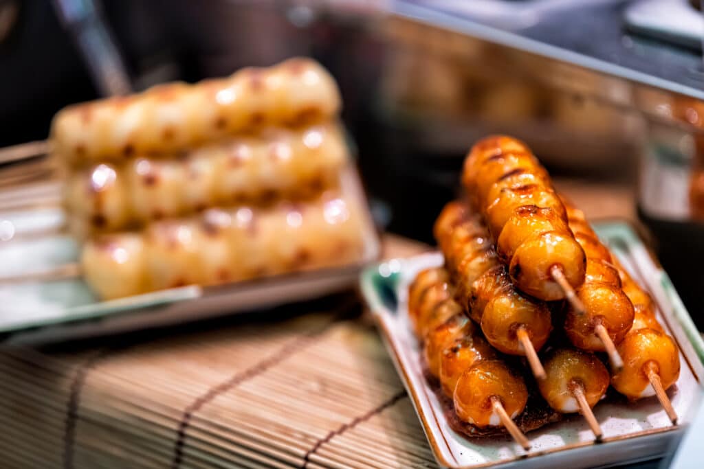 Dango skewers glazed with sweet soy sauce at a Japanese food stall