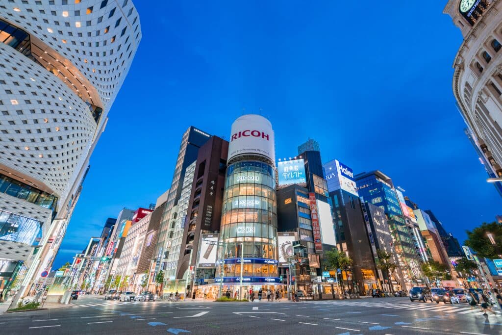 Ginza shopping district in Tokyo with modern buildings and city lights