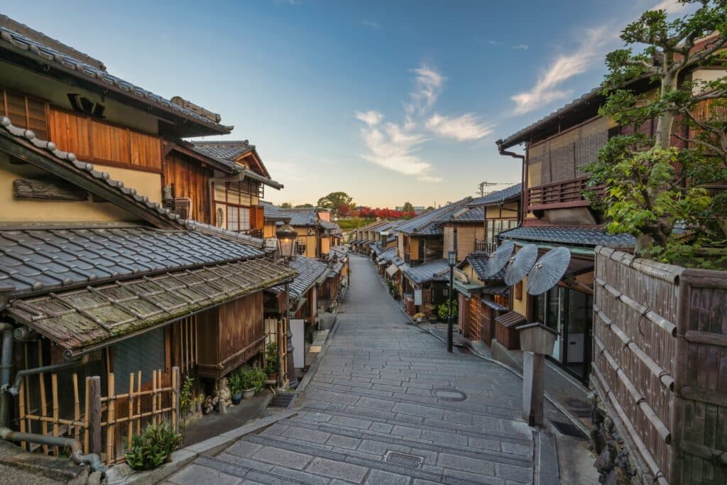 traditional street in Higashiyama Kyoto with wooden houses and stone path