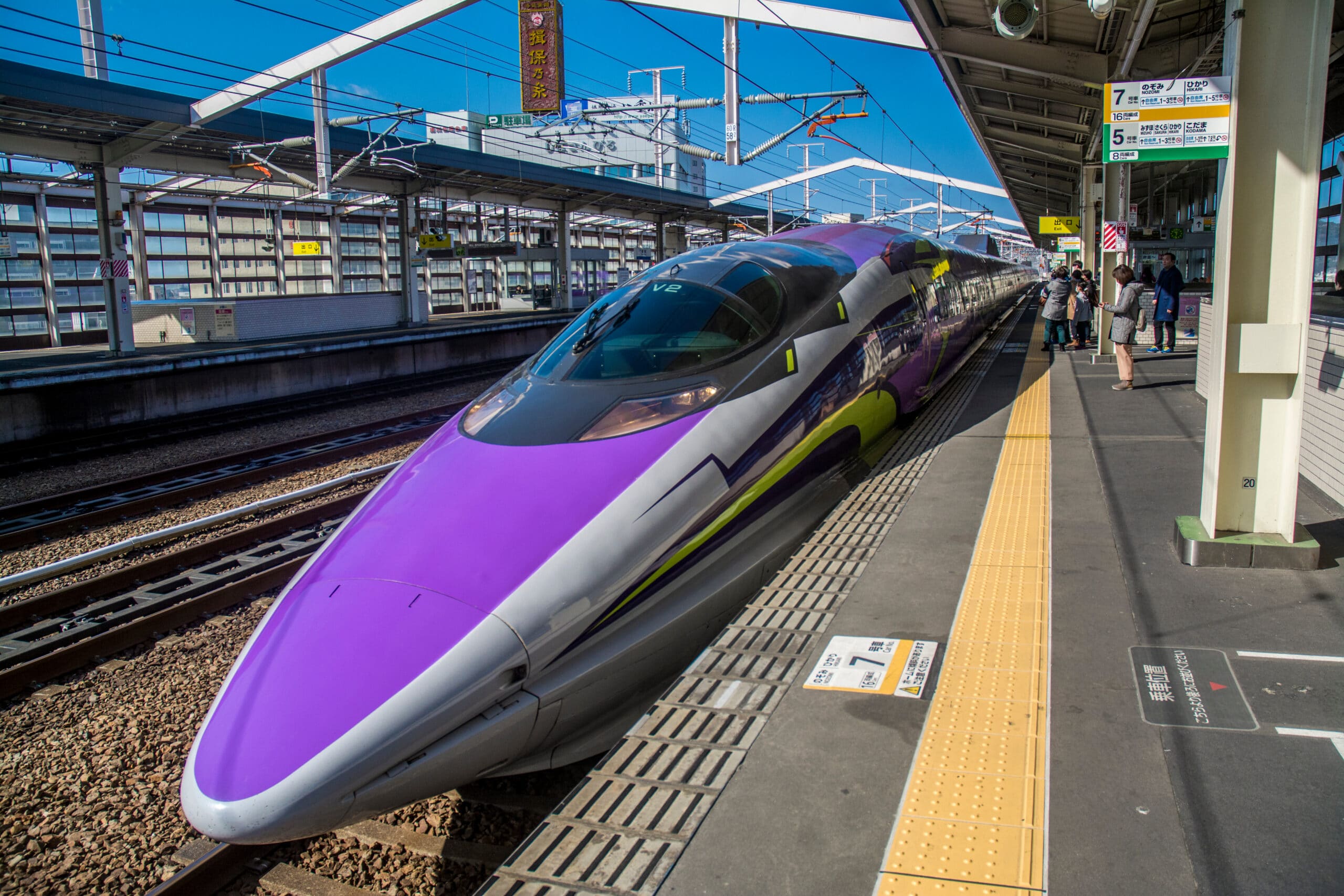 Shinkansen bullet train stopped at a station platform in Japan