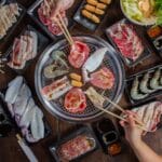 Japanese yakiniku barbecue with meat seafood and vegetables grilled on charcoal