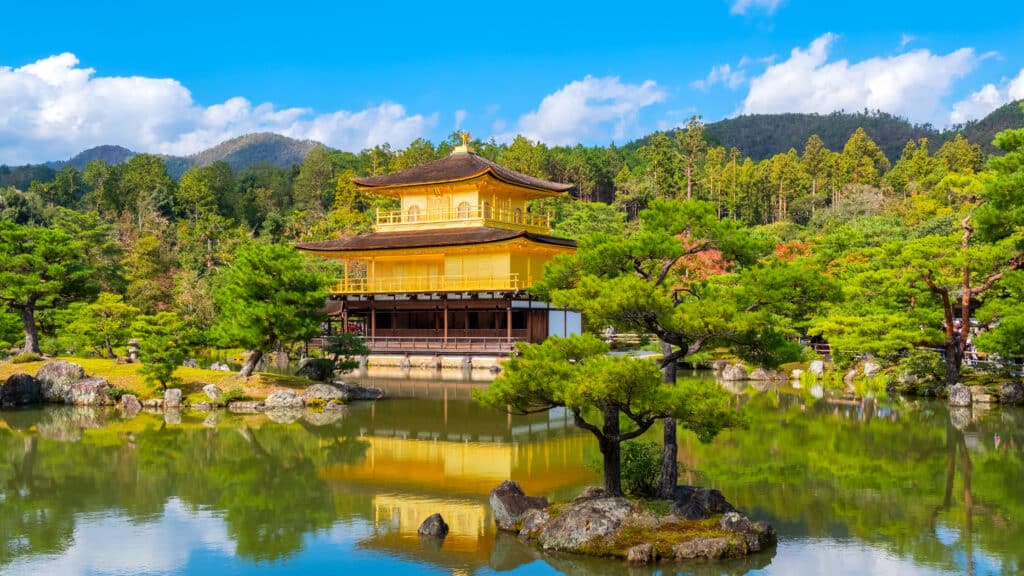 Kinkaku-ji Golden Pavilion reflected in pond in Kyoto