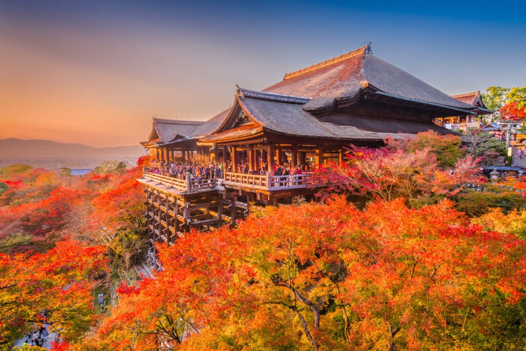 Kiyomizu-dera Temple in Kyoto surrounded by autumn foliage