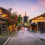 Kyoto old town street with pagoda at sunset