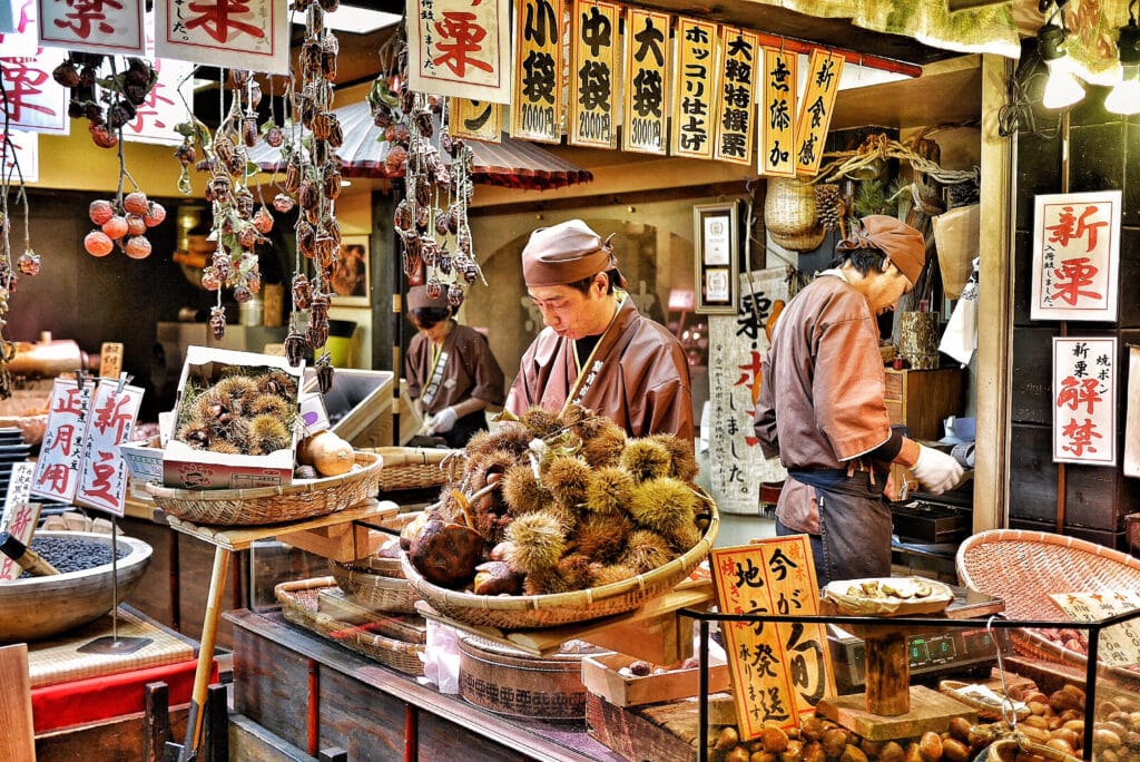 Traditional food stall in Kyoto market selling local snacks