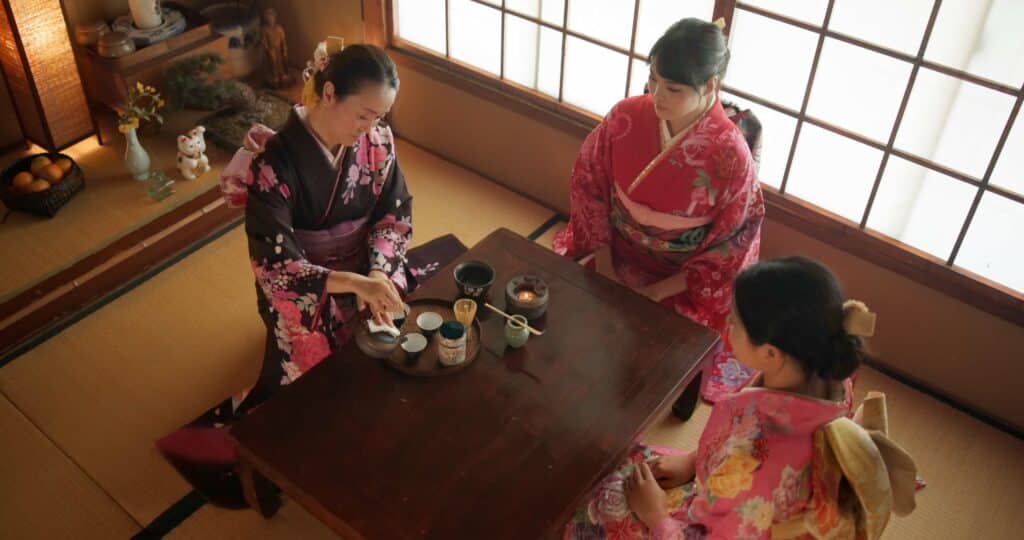 Traditional tea ceremony experience in Kyoto with people wearing kimono