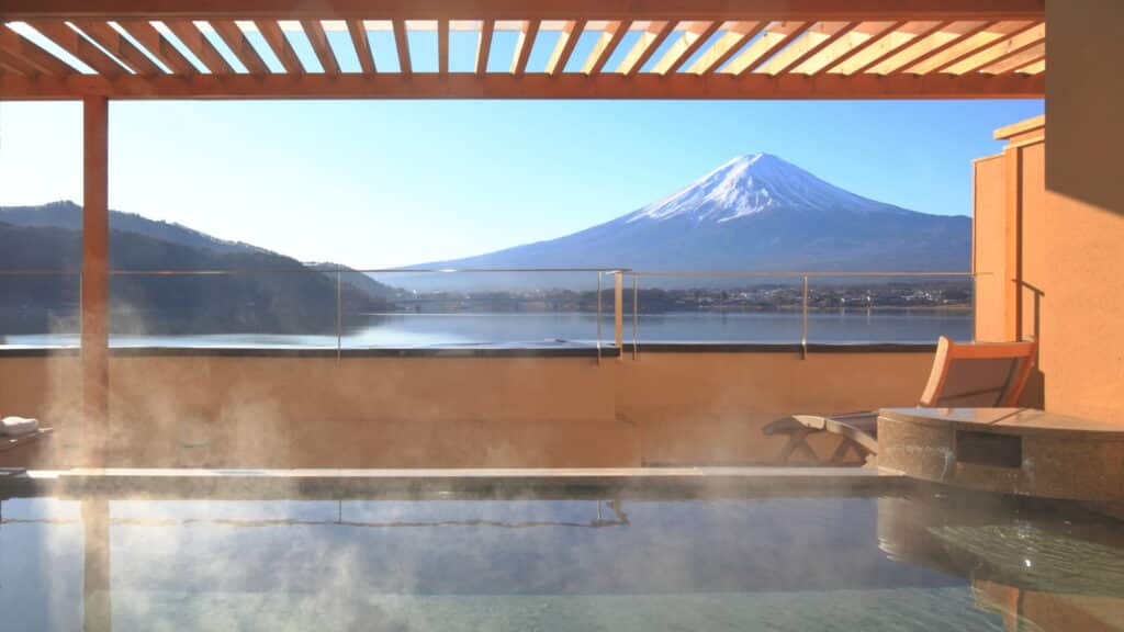 Hot spring onsen bath with view of Mount Fuji and Lake Kawaguchiko