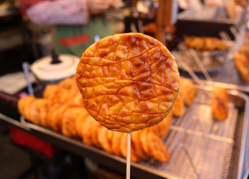Fresh senbei rice cracker sold at a Japanese street food stall