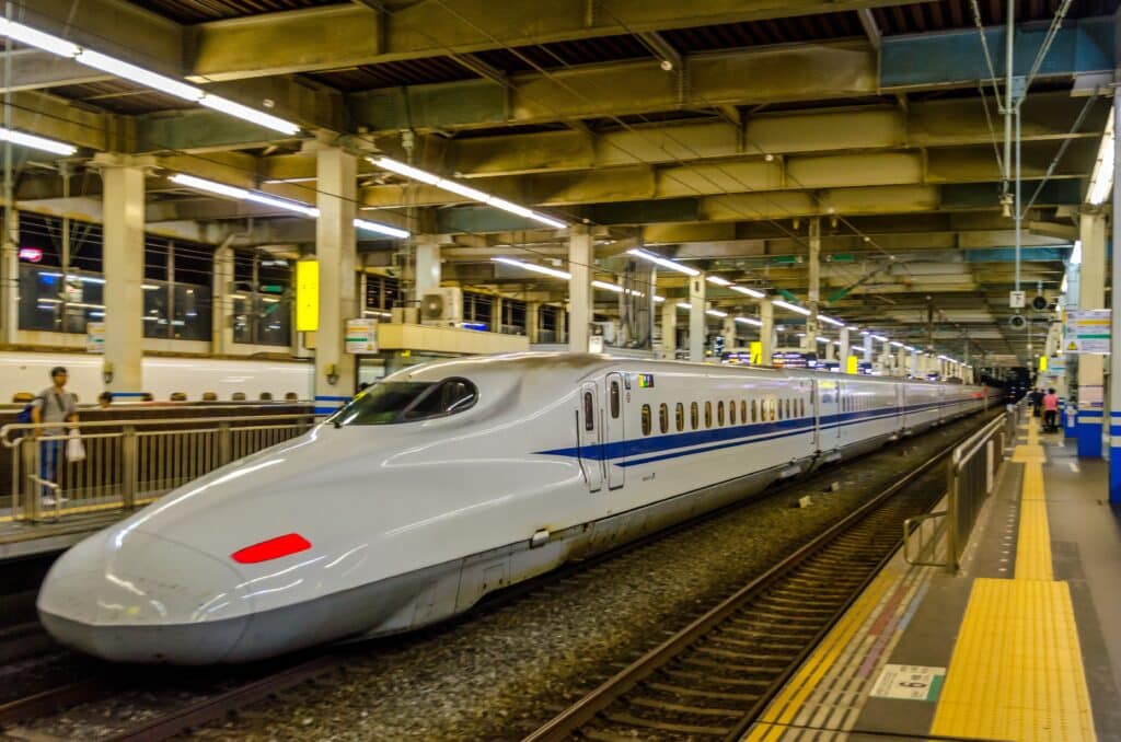 Shinkansen bullet train at station platform in Japan ready for departure