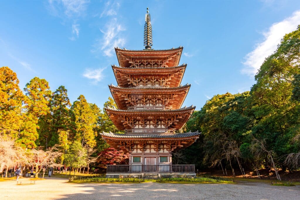 five-story pagoda at To-ji Temple in Kyoto surrounded by trees