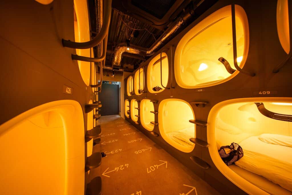 Capsule hotel pods in Tokyo with modern sleeping compartments