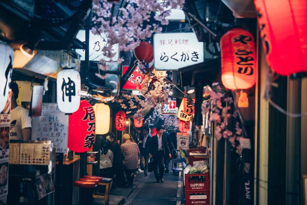 Tokyo izakaya alley with lanterns and small local restaurants