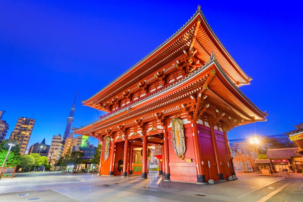 Senso ji Temple in Asakusa Tokyo illuminated at night with Tokyo Skytree in the background