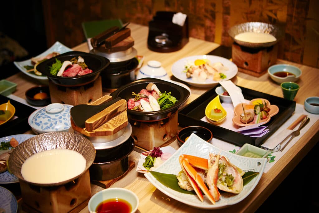 Traditional Japanese kaiseki meal with multiple small seasonal dishes