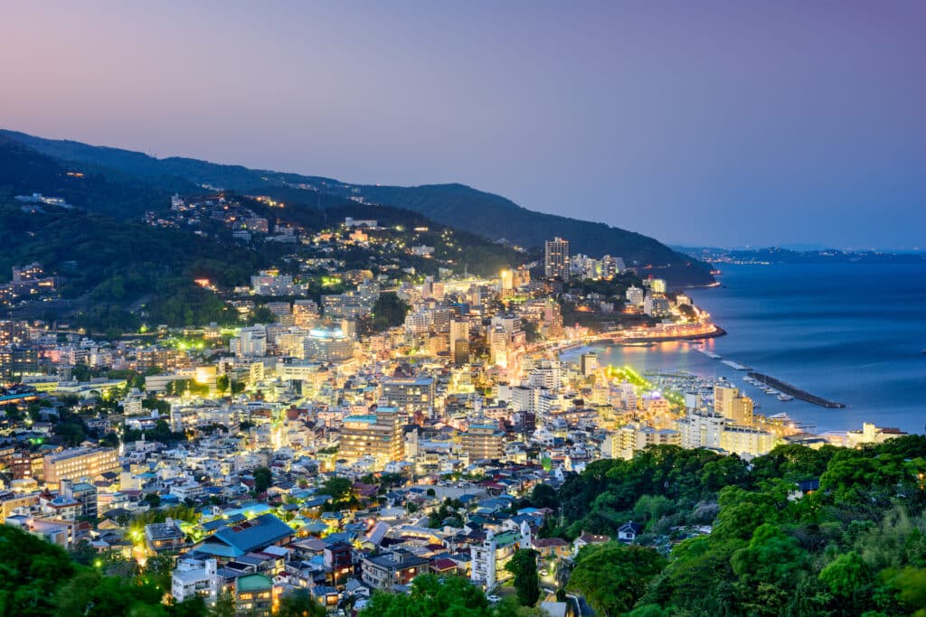 Night view of Atami Onsen coastal hot spring town in Japan