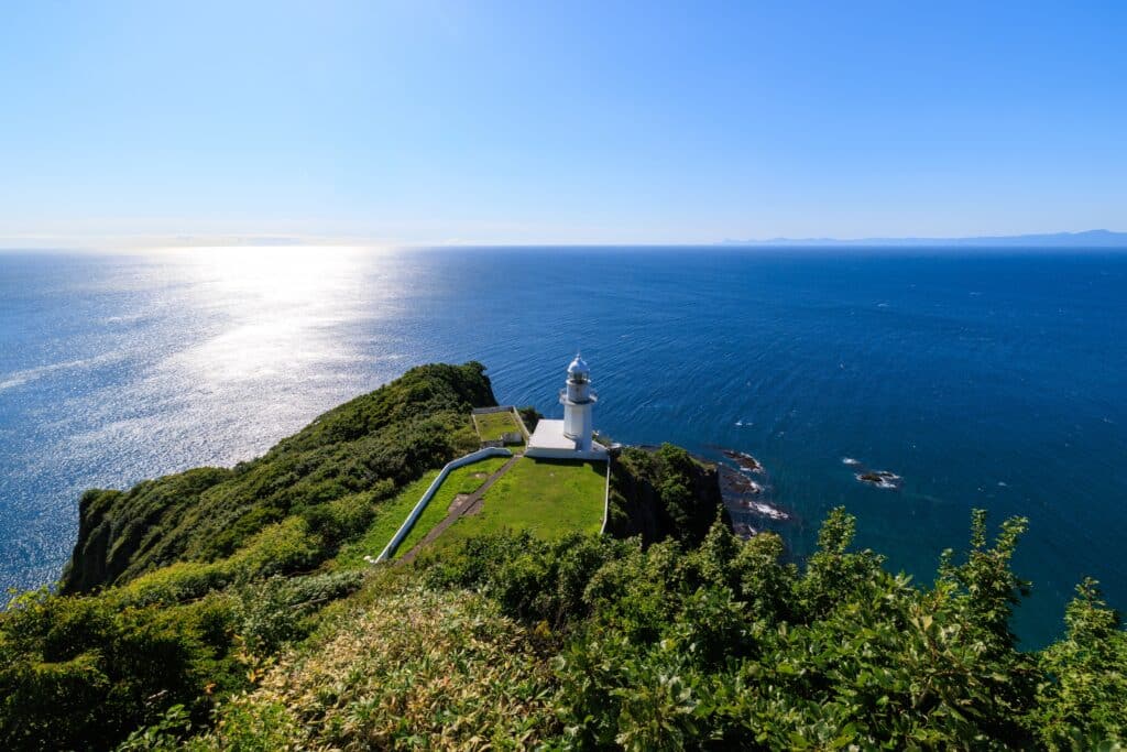 Cape Kamui lighthouse and rugged coastline on the Shakotan Peninsula in Hokkaido
