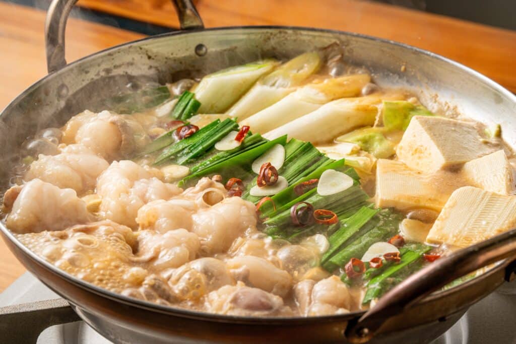 Traditional Fukuoka motsunabe hot pot with vegetables and broth
