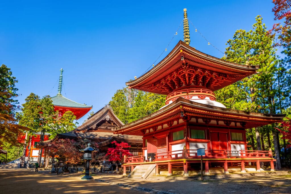 Historic temple buildings in Koyasan surrounded by forest and autumn colors