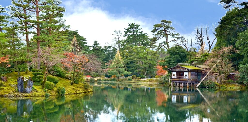 Traditional pond and teahouse scenery inside Kenroku-en Garden