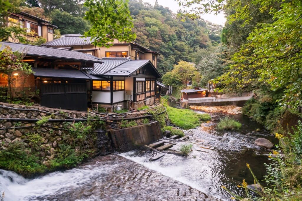Traditional ryokan and river in Kurokawa Onsen Japan