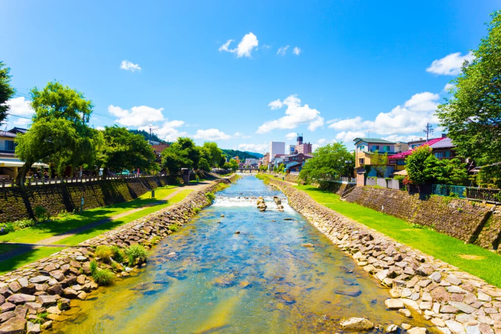 Miyagawa River flowing through central Takayama on a sunny day