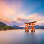 Floating torii gate of Miyajima photographed with a long exposure during sunset