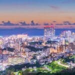 Night view over Naha city and coastline in Okinawa