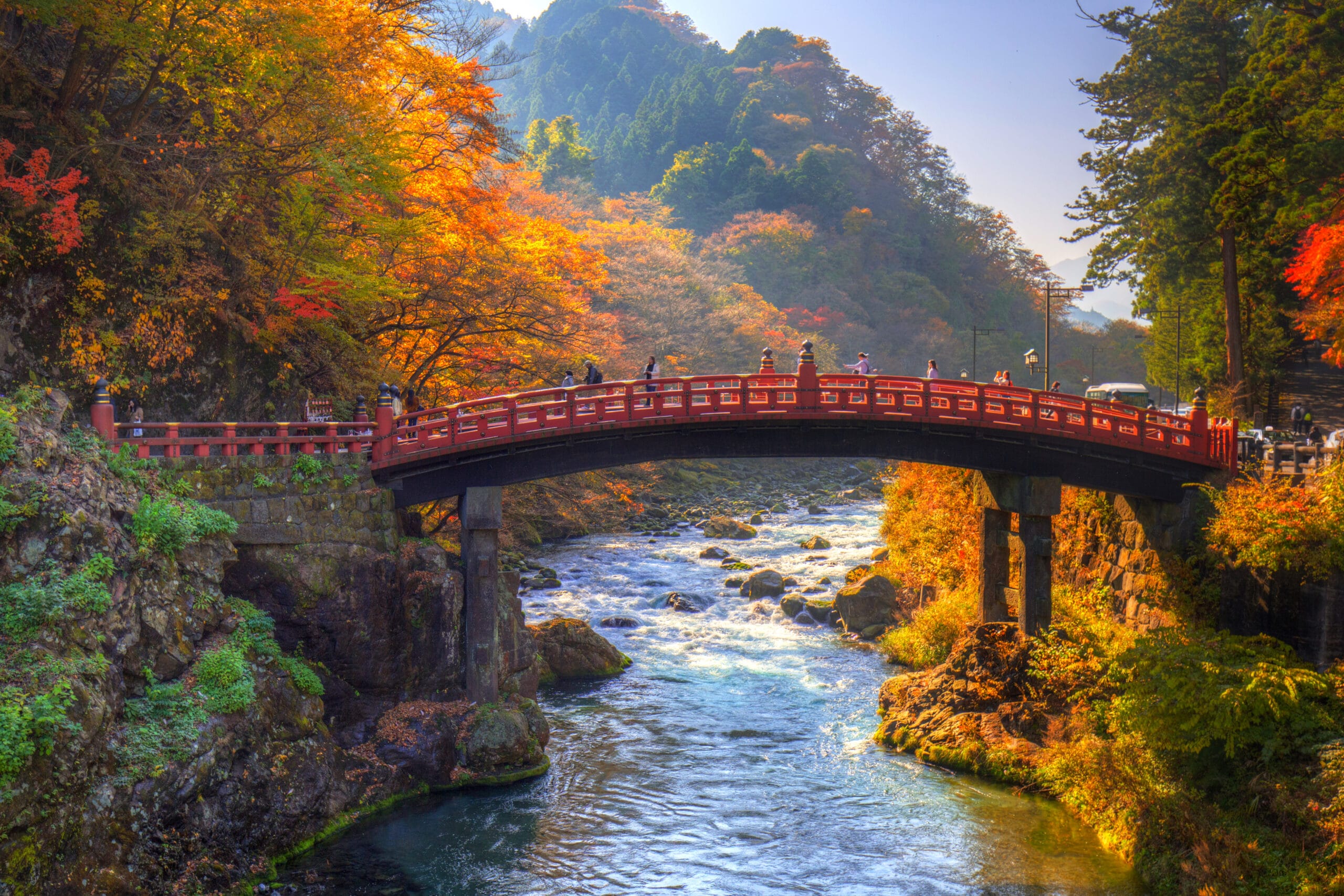Shinkyo Bridge surrounded by autumn foliage in Nikko