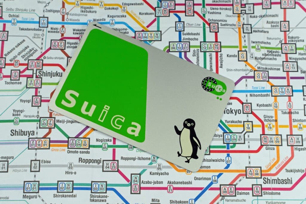 Suica transportation card placed on a Tokyo subway map for convenient travel in Japan