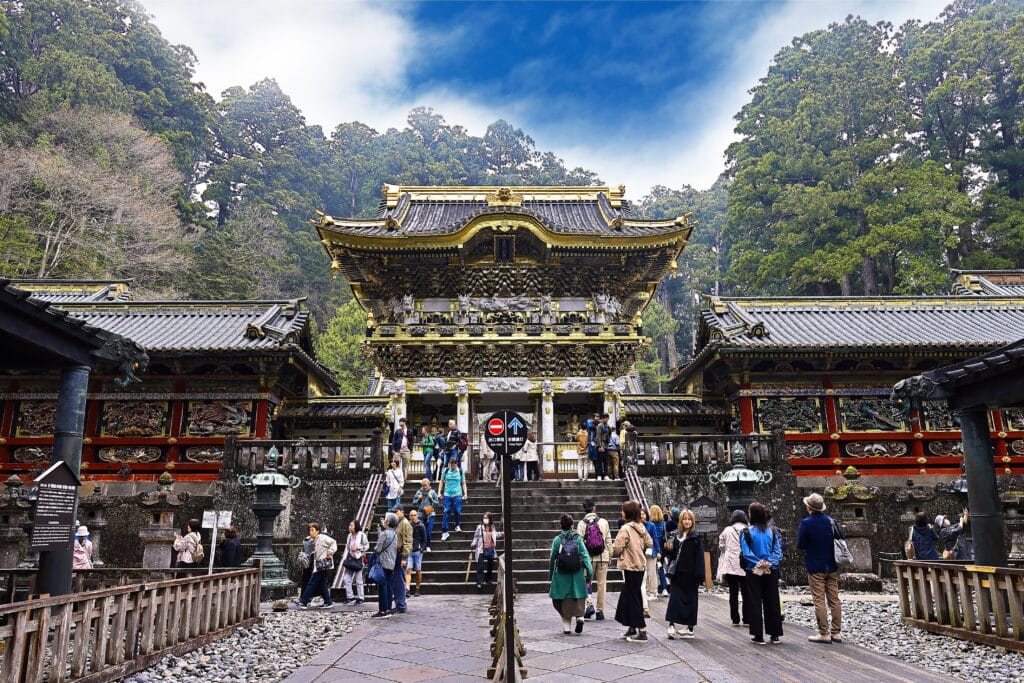 Visitors walking near the main gate of Toshogu Shrine