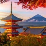 Chureito Pagoda with Mount Fuji surrounded by colorful autumn foliage
