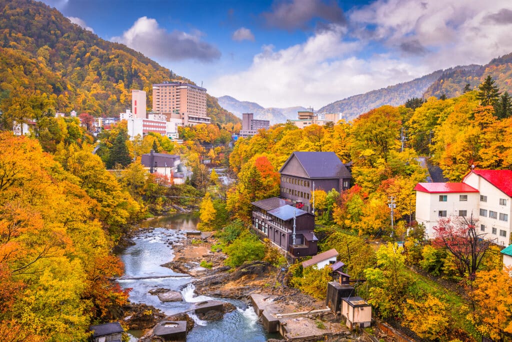 Autumn foliage surrounding the river and hot spring resort area of Jozankei near Sapporo