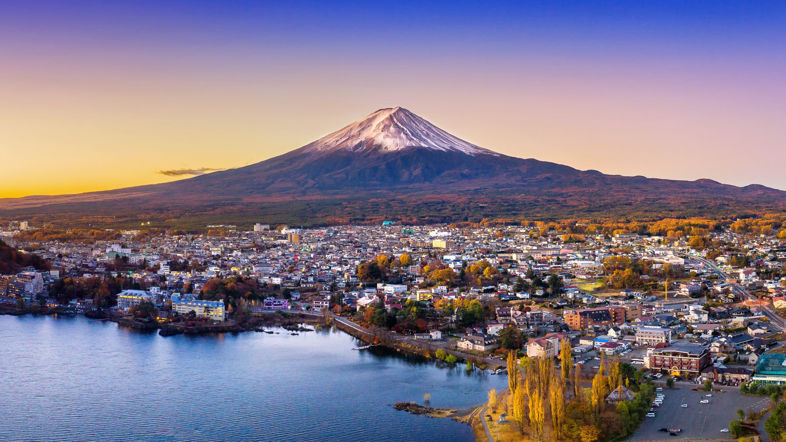 Panoramic view of Kawaguchiko town and Lake Kawaguchi with Mount Fuji at sunset