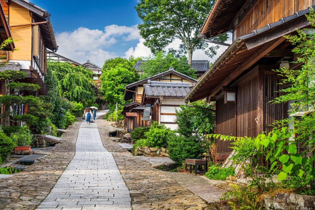 Stone-paved street lined with traditional wooden buildings in Magome-juku along the historic Nakasendo route