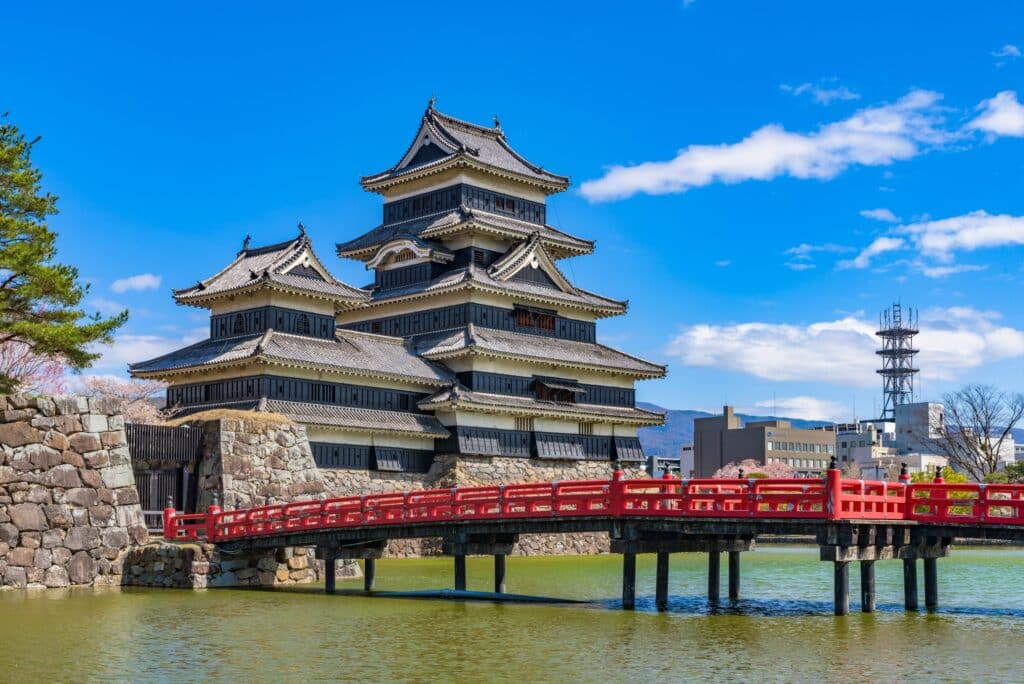 Matsumoto Castle with its famous red bridge in Nagano Prefecture