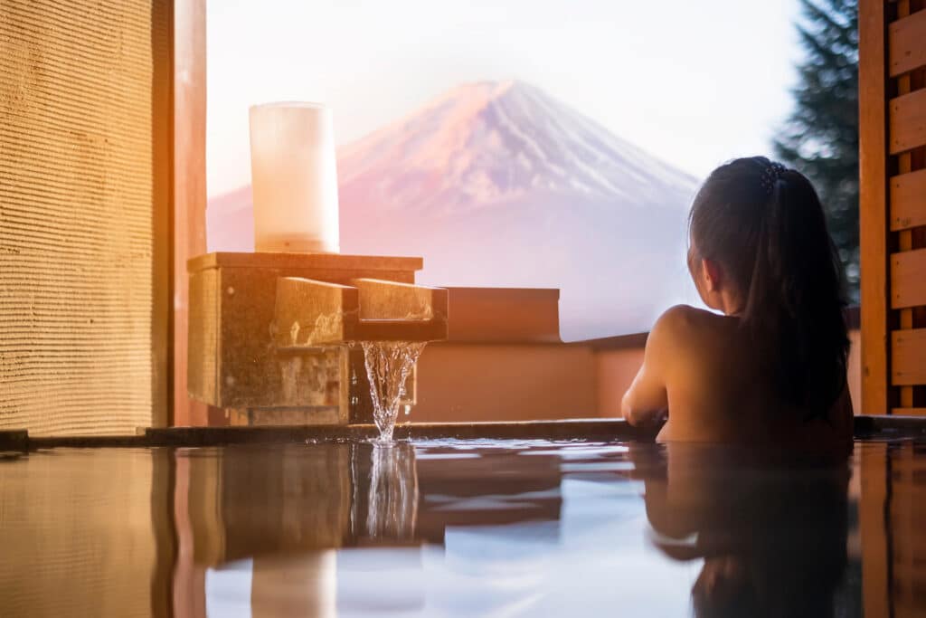 Outdoor hot spring bath overlooking Mount Fuji near Kawaguchiko