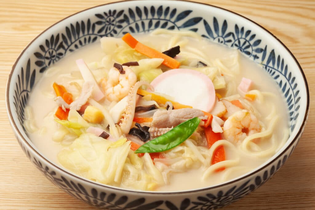 Bowl of Nagasaki Champon noodles with seafood, vegetables and creamy broth