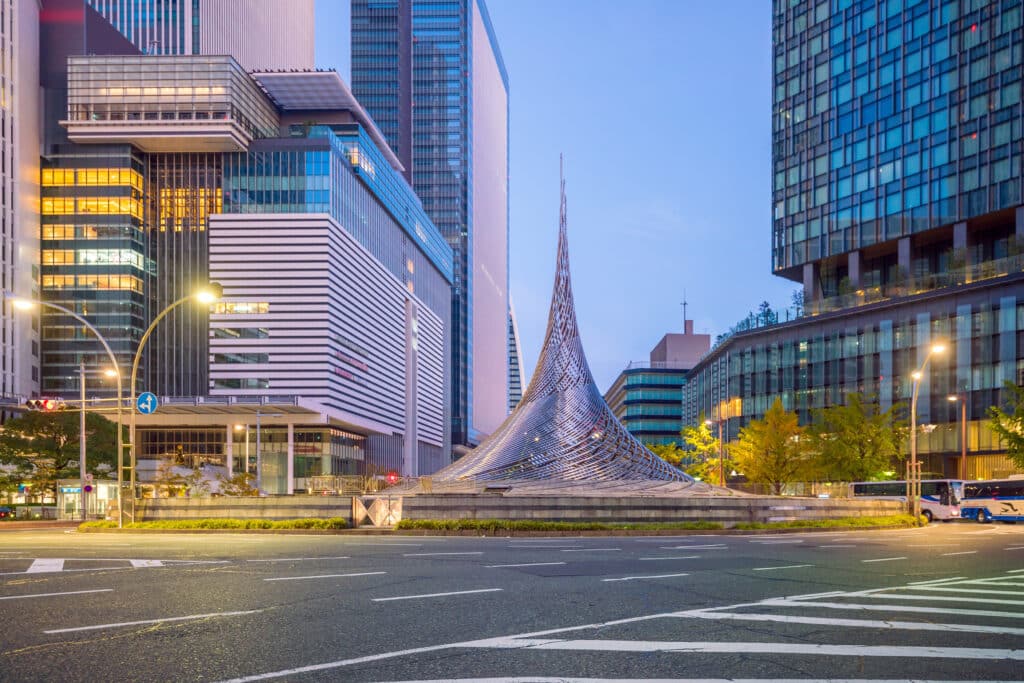 The iconic Mode Gakuen Spiral Towers surrounded by modern skyscrapers in central Nagoya