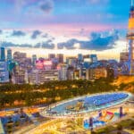 Oasis 21 and Nagoya TV Tower illuminated at sunset in the Sakae district