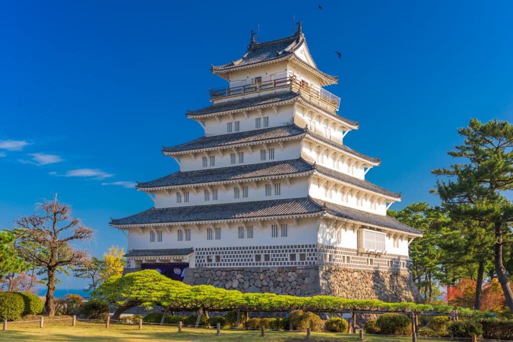 Historic Shimabara Castle in Nagasaki Prefecture under a clear blue sky
