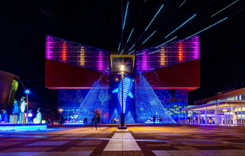 Illuminated Osaka Aquarium Kaiyukan building at night