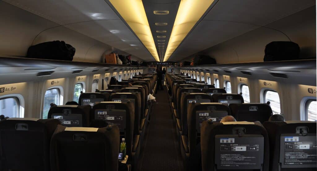 Interior of a Shinkansen Green Car with rows of seats