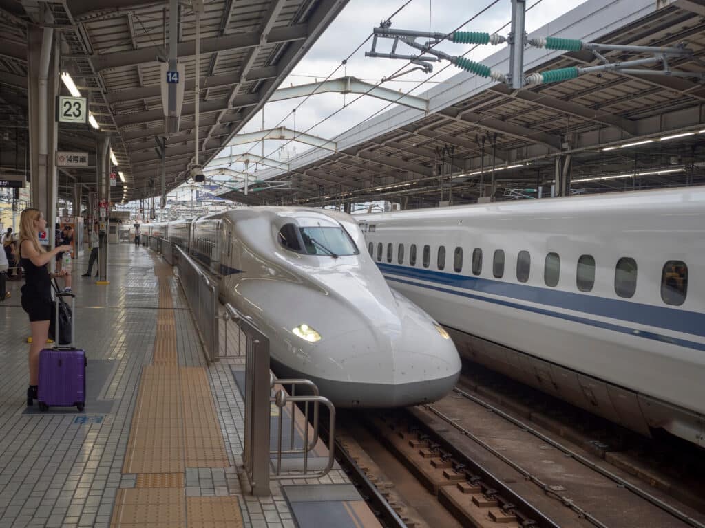 Shinkansen bullet trains at a railway station in Japan
