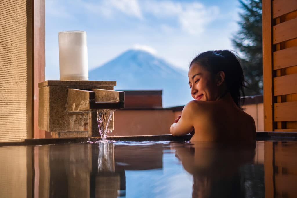 Japanese onsen with Mount Fuji in the background