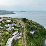Train travelling along the coast near St Ives in Cornwall